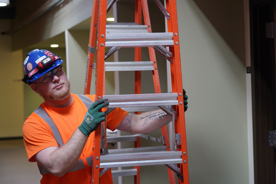 construction worker with ladder